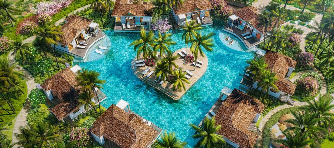 Heart shaped resort pool with bungalows